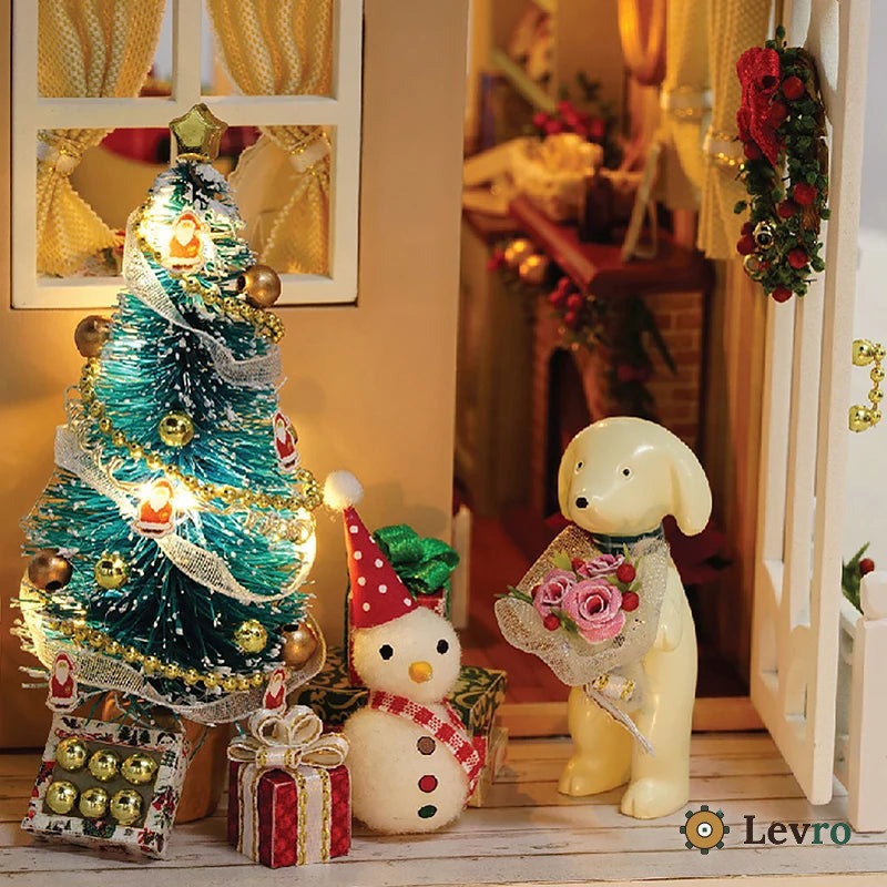 Tiny Christmas tree, snowman and puppy inside the cabin