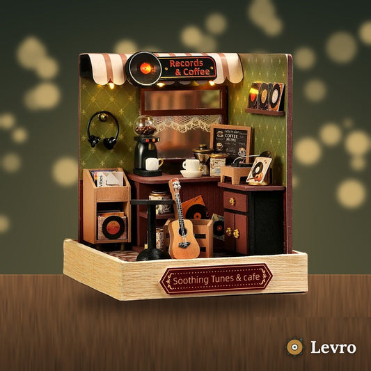 Records & Coffee miniature kit glowing on a cozy shelf at night