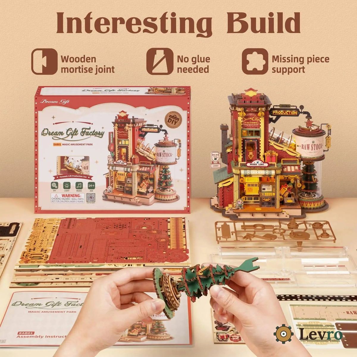 Levro Dream Gift Factory kit contents: laser-cut wood sheets, mortise joints, no glue needed, and hands assembling a piece
